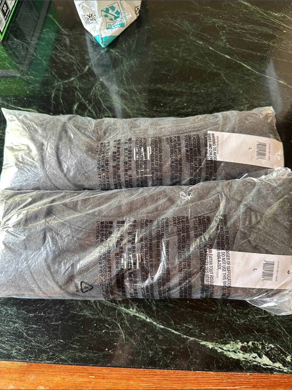 Lot of 2 NWT GAP men’s tees in charcoal grey size large